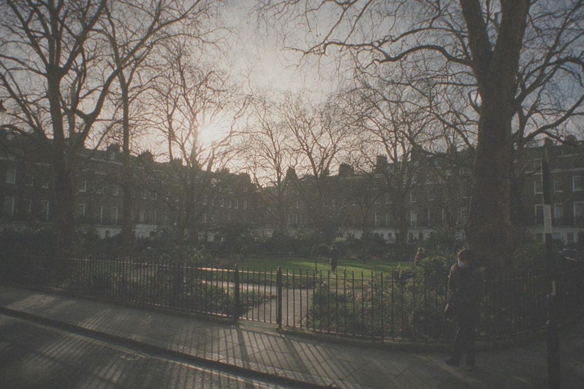 Kensington Palace red brick facade seen from the gardens on a bright morning